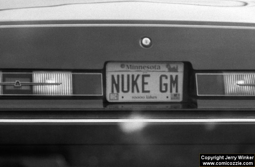 License plate on the back of a Ford Thunderbird.