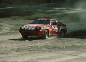 David Lapham / Susan Ferretti Mitsubishi Starion slides through the final corner of SS1.