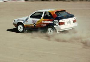 Rod Millen / Harry Ward in their Gr. A Mazda 323GTX.