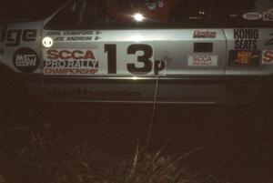 John Crawford / Joe Andreini in their Dodge Shadow at night.