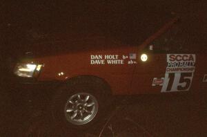 Dan Holt / Dave White in their Toyota Corolla GTS at night.