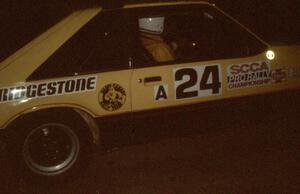 Don Rathgeber / John Huber in the Hairy Canary Racing Mustang roar through the night stages.