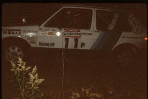 Guy Light / Jimmy Brandt in their P class VW GTI at night.