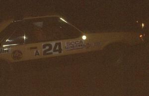 Don Rathgeber / John Huber in their Ford Mustang at night.