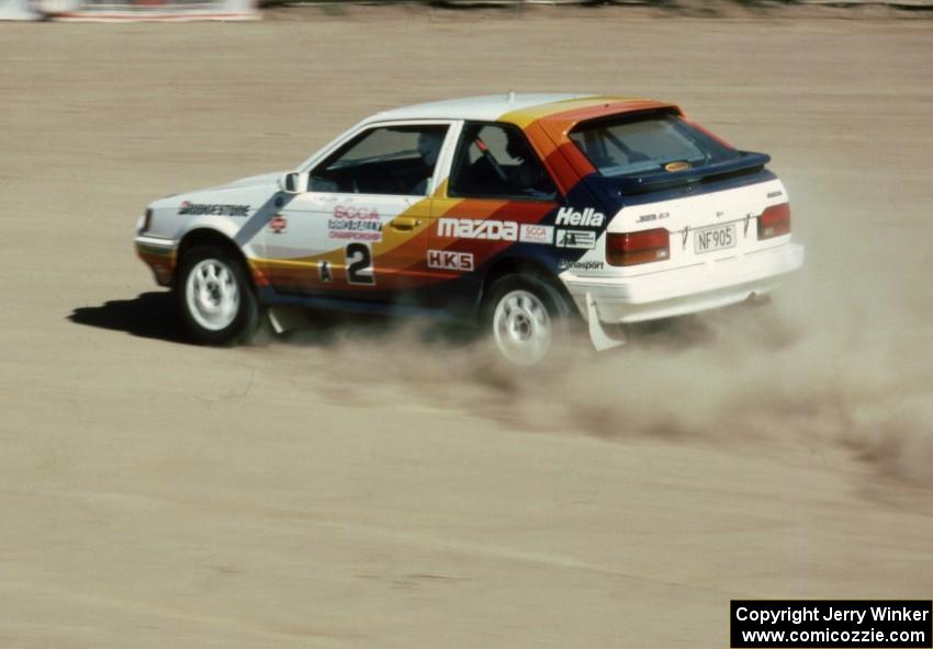 Rod Millen / Harry Ward in their Gr. A Mazda 323GTX.