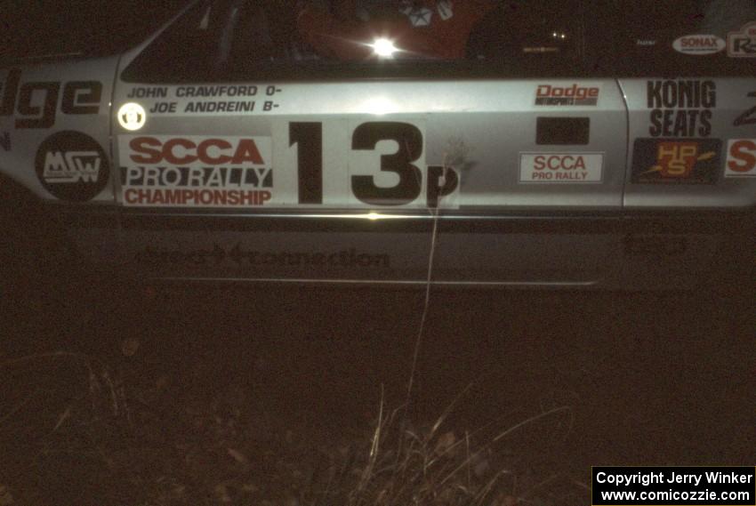 John Crawford / Joe Andreini in their Dodge Shadow at night.