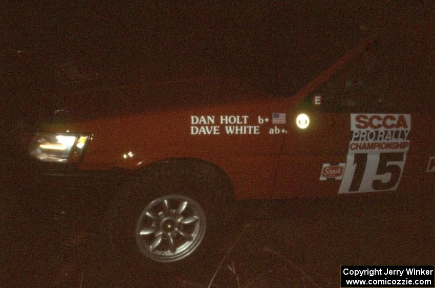 Dan Holt / Dave White in their Toyota Corolla GTS at night.