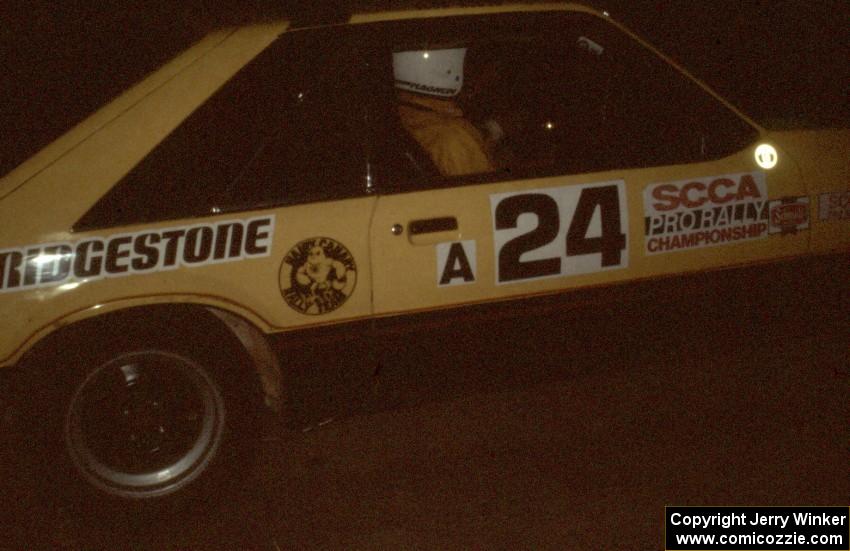 Don Rathgeber / John Huber in the Hairy Canary Racing Mustang roar through the night stages.