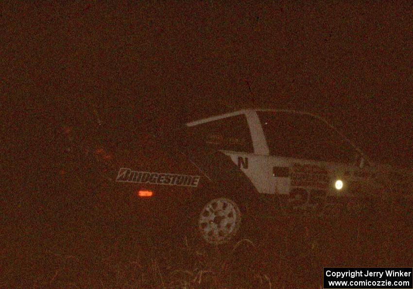 Troy Sika / Wayne Rood in their Nissan 300ZX at night.