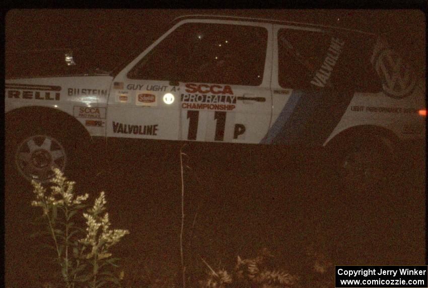 Guy Light / Jimmy Brandt in their P class VW GTI at night.