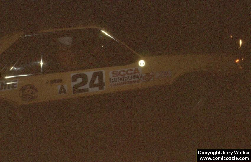 Don Rathgeber / John Huber in their Ford Mustang at night.