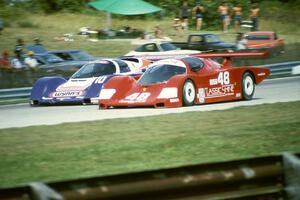 Tim McAdam / Chip Mead / John Higgins Fabcar CL/Porsche and  Jim Adams / John Hotchkis Porsche 962