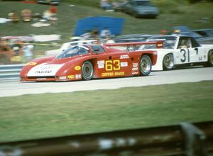 Jim Downing / John Maffucci Argo JM19/Mazda (Lights) passes the Mark Altman / Gary Altman Porsche 914/6 (GTU)