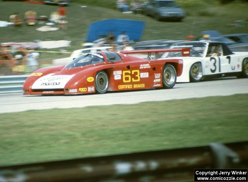 Jim Downing / John Maffucci Argo JM19/Mazda (Lights) passes the Mark Altman / Gary Altman Porsche 914/6 (GTU)