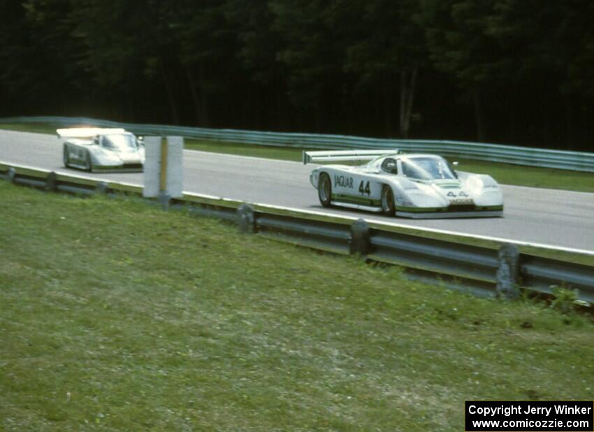 Bob Tullius / Chip Robinson Jaguar XJR-7 chased by the  Brian Redman / Hurley Haywood Jaguar XJR-7