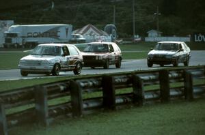 The VW GTIs of Paul Hacker / Karl Hacker and ??? / ??? and Alfa-Romeo Milano of Duncan MacLean / Scott MacLean