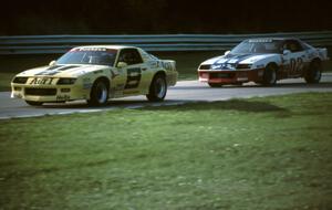 Skip Gunnell / Scott Flanders Chevy Camaro chased by the John Petrick / Glen Cross Chevy Camaro
