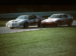 Bill Bayley / Andy Pilgrim Pontiac Firebird passes the Pete Cook / Terry Abbott Porsche 944