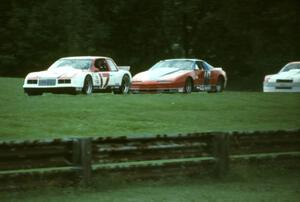 Dick Danielson's Buick Somerset leads Clay Young's Pontiac Firebird and Jerry Thompson's Chevy Beretta