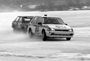 Dave Markquart / Jeff Sinden Toyota FX-16 battles the Don Coatsworth / Marianne Coatsworth VW Fox