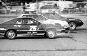 Showroom Stock A Battle: Gerry Mason's Mitsubishi Starion leads Bill Holcomb's Pontiac Sunbird and Chuck Neuman's Dodge Charger