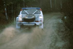 Bill Holmes / Jean Lindamood rocket from the start of the stage throwing rooster-tails from their Ford F-150.