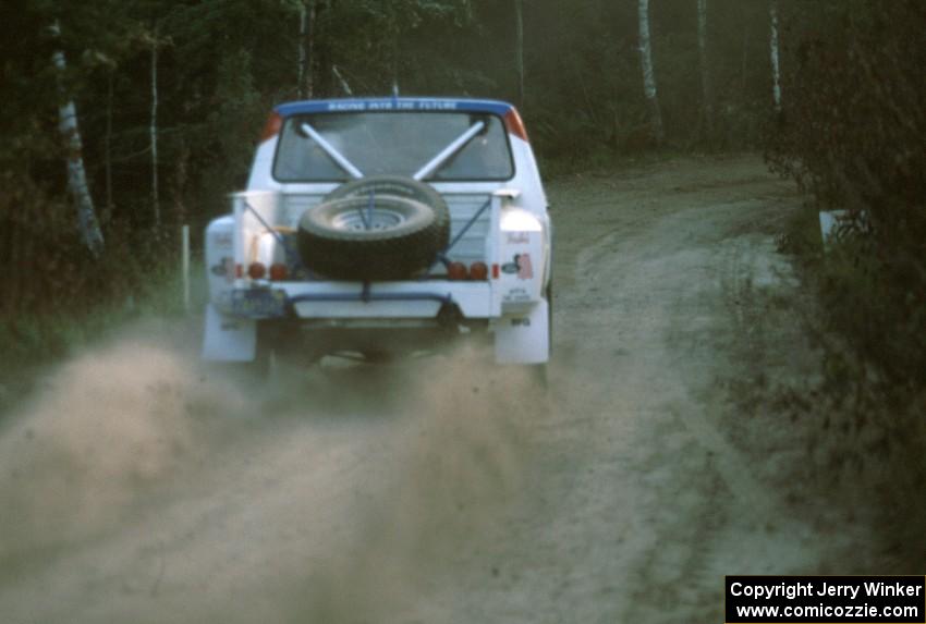 Bill Holmes / Jean Lindamood rocket from the start of the stage throwing rooster-tails from their Ford F-150.