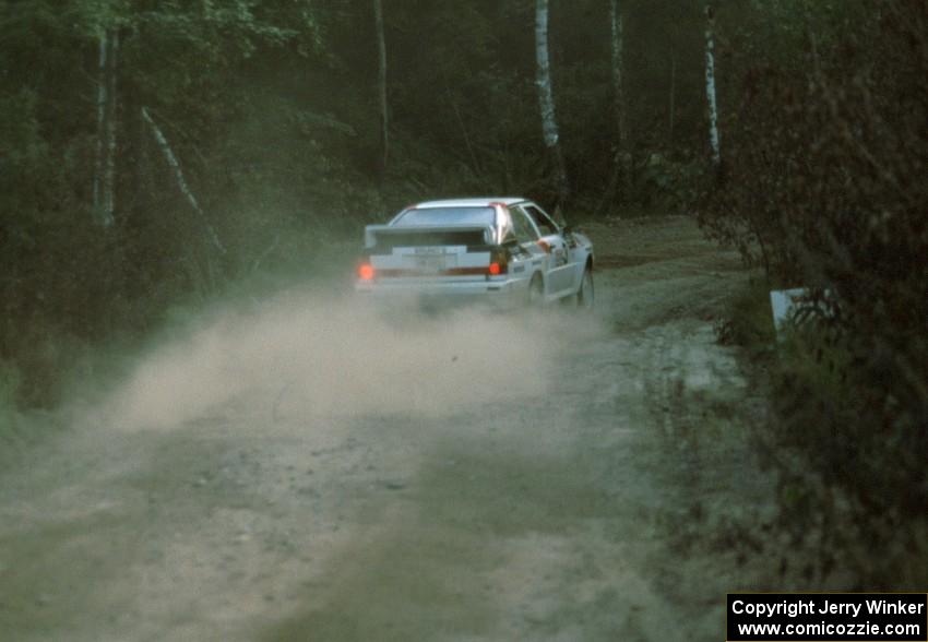 Bruno Kreibich and Clark Bond rocket into the first turn in their Audi Quattro.