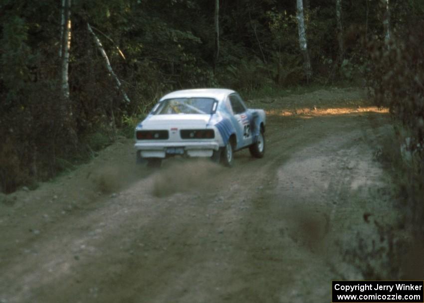 Chuck VanDamme / Thomas VanDamme leave the start of an afternoon stage in their Mazda RX-3.