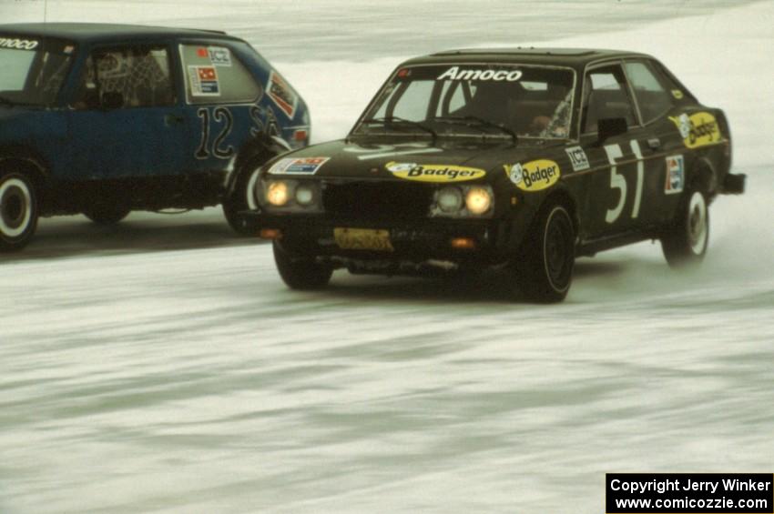 John Nytes / Jerry Nytes Fiat 128 Sport passes the Jerry Madison / Bob Youngdahl, Jr. / Nancy Johnson VW Rabbit