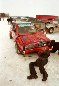 Work is performed to get the Dave Kapaun VW Rabbit ready for the enduro after crashing hard in the modified race.