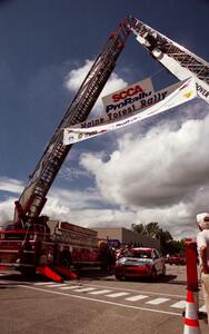 Garen Shrader / Michael Fennell Mitsubishi Lancer Evo IV pull up to the line at the ceremonial start