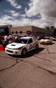 Vinnie Frontinan / Luis Teixeira and Keith Townsend / Ian McEwen Mitsubishi Lancer Evo IVs at the ceremonial start