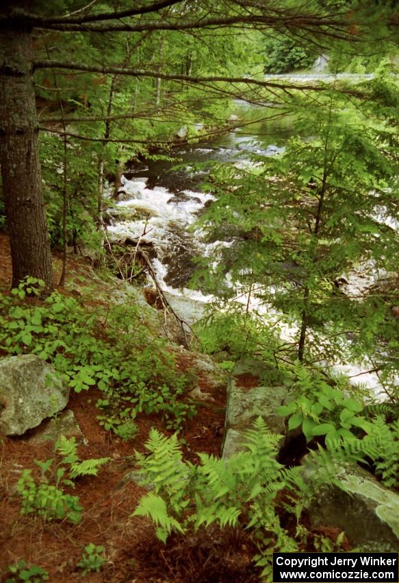 View of a roadside waterfall in Maine