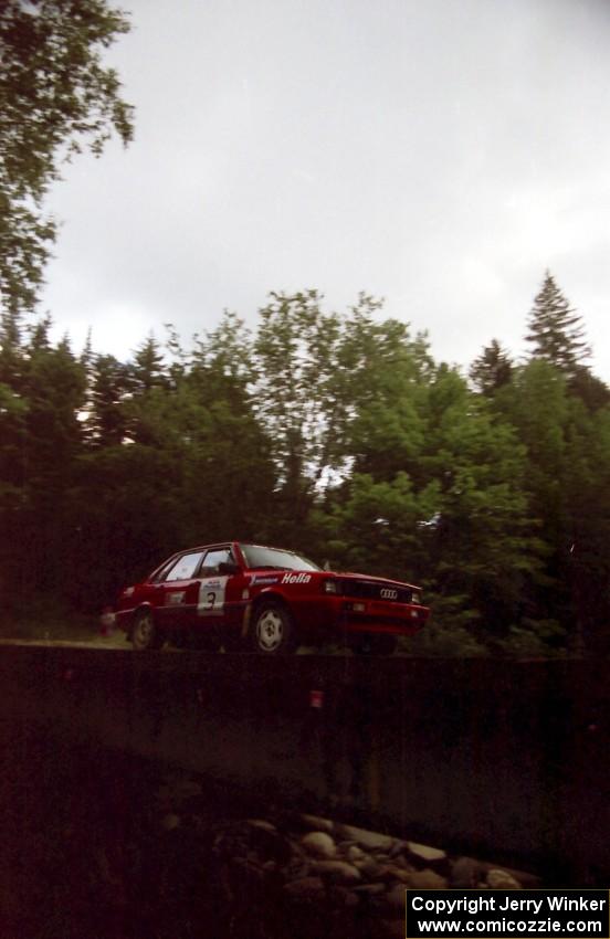 Jon Kemp / Gail McGuire Audi 4000 Quattro View on the last bridge on SS4 (East Town E.)