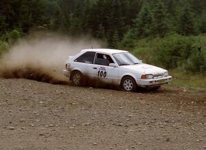 Donal Mulleady / Eoin McGeough Mazda 323GTX on SS7 (Parmachenee East)