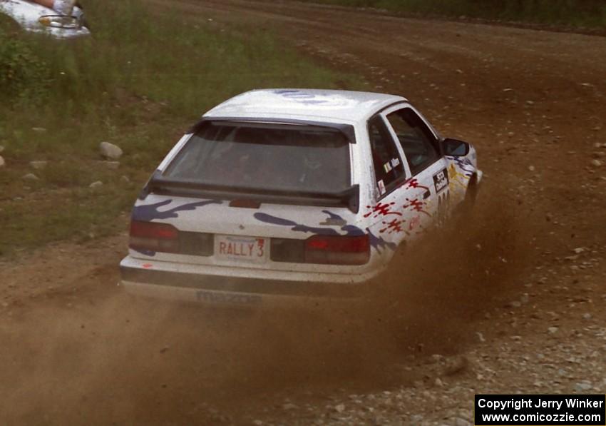 Marty Allen / Dick Casey Mazda 323GTX on SS6 (Parmachenee West)