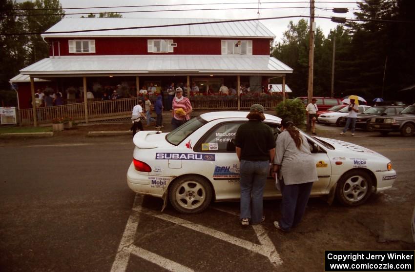 Greg Healey / John MacLeod Subaru Impreza pulls into Ocquossoc service