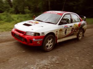 Garen Shrader / Michael Fennell Mitsubishi Lancer Evo IV finishes SS9 (Magalloway Long)