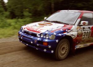 Kurosh Jahromi / Tony Lumino Ford Escort Cosworth RS finishes SS9 (Magalloway Long)