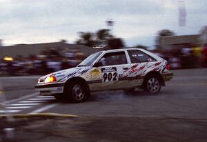 Marty Allen / Dick Casey Mazda 323GTX on SS10 (In Town)