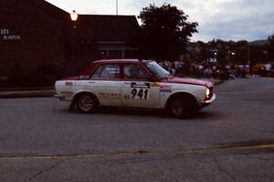 Dan Cook / Bill Rhodes Datsun 510 in the middle of a 360 on SS10 (In Town)