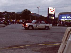 Dan Cook / Bill Rhodes Datsun 510 complete a 360 on SS10 (In Town)