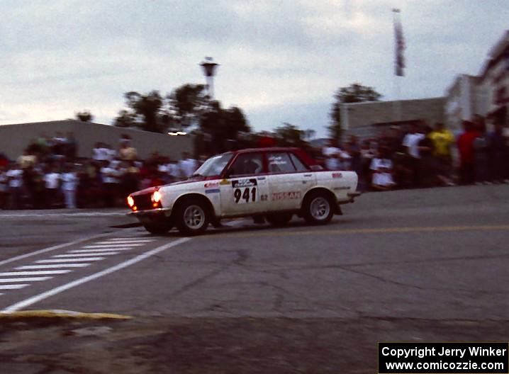 Dan Cook / Bill Rhodes Datsun 510 start a 360 on SS10 (In Town)