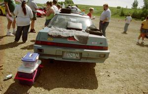 Drivers mill about Todd Erickson's Subaru XT at registration