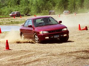 Jesse Mullan's Subaru Impreza with Norm Johnson as his passenger