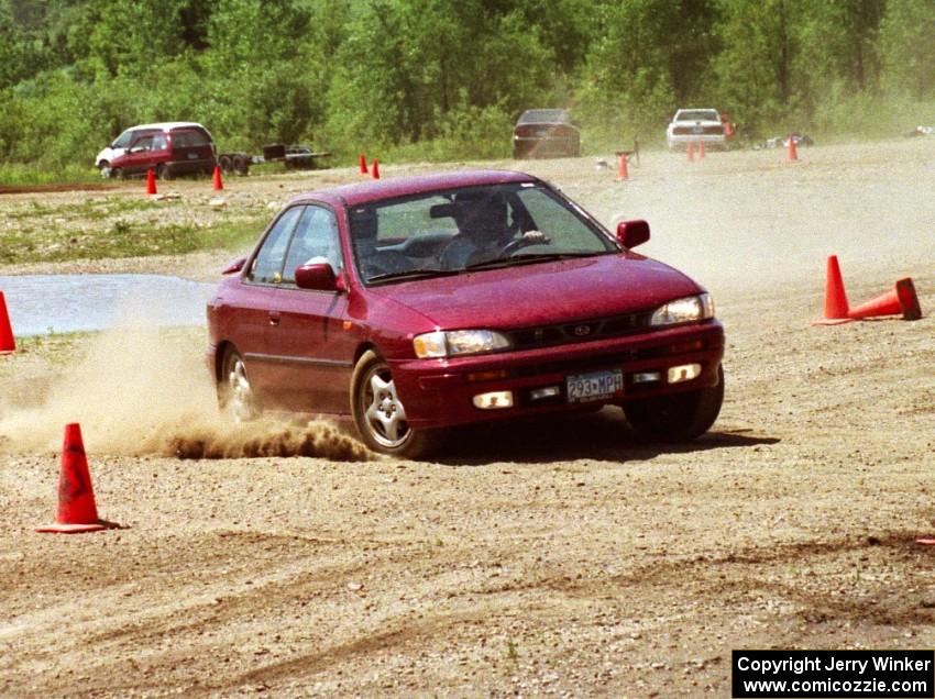 Jesse Mullan's Subaru Impreza with Norm Johnson as his passenger