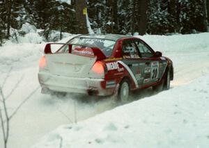 Andrew Comrie-Picard / Marc Goldfarb Mitsubishi Lancer Evo IV on SS4 (McCormick)