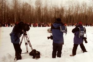 A Speed Channel cameraman, Tom McKinney and Morgan Segal pan as the Russ Hodges / Mike Rossey Subaru WRX passes by on SS12