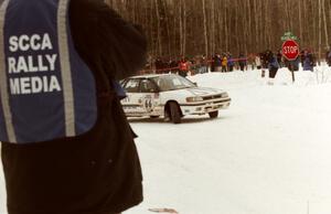 Pete Kuncis gets a clearer shot of the Ted Mendham / Lise Mendham Subaru Legacy on SS12 (Meaford)